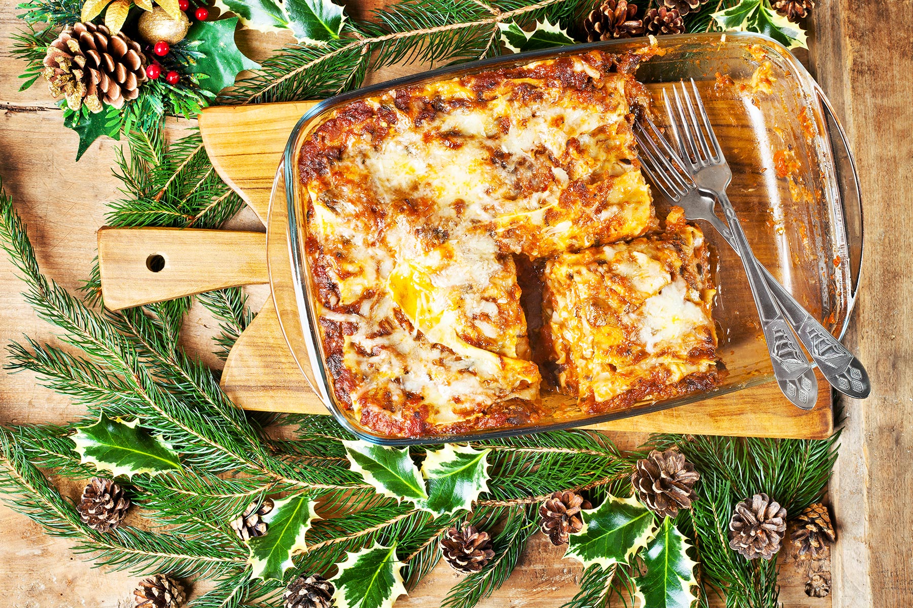 holiday catering menu orange county - Christmas background with lasagna. Italian homemade family dish